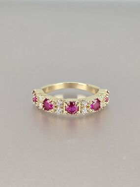 Gold Ring with Red Ans Clear Gemstones